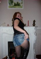 Рыжая красотка в чулках и сапогах показала пилотку 1 фото Рыжая красотка в чулках и сапогах показала пилотку 1 фото