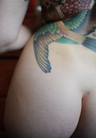 Неформалка хвастается татуировкой на всю спину 31 фото Неформалка хвастается татуировкой на всю спину 31 фото