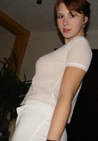 Рыжая шалава дразнит большими грудями в квартире 9 фото Рыжая шалава дразнит большими грудями в квартире 9 фото